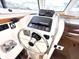 Helm with New plotter, New gauges and Bowthruster to hand